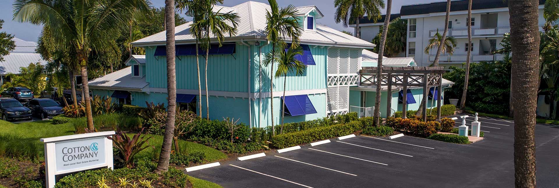 blue building in stuart florida, cotton and company head quaters